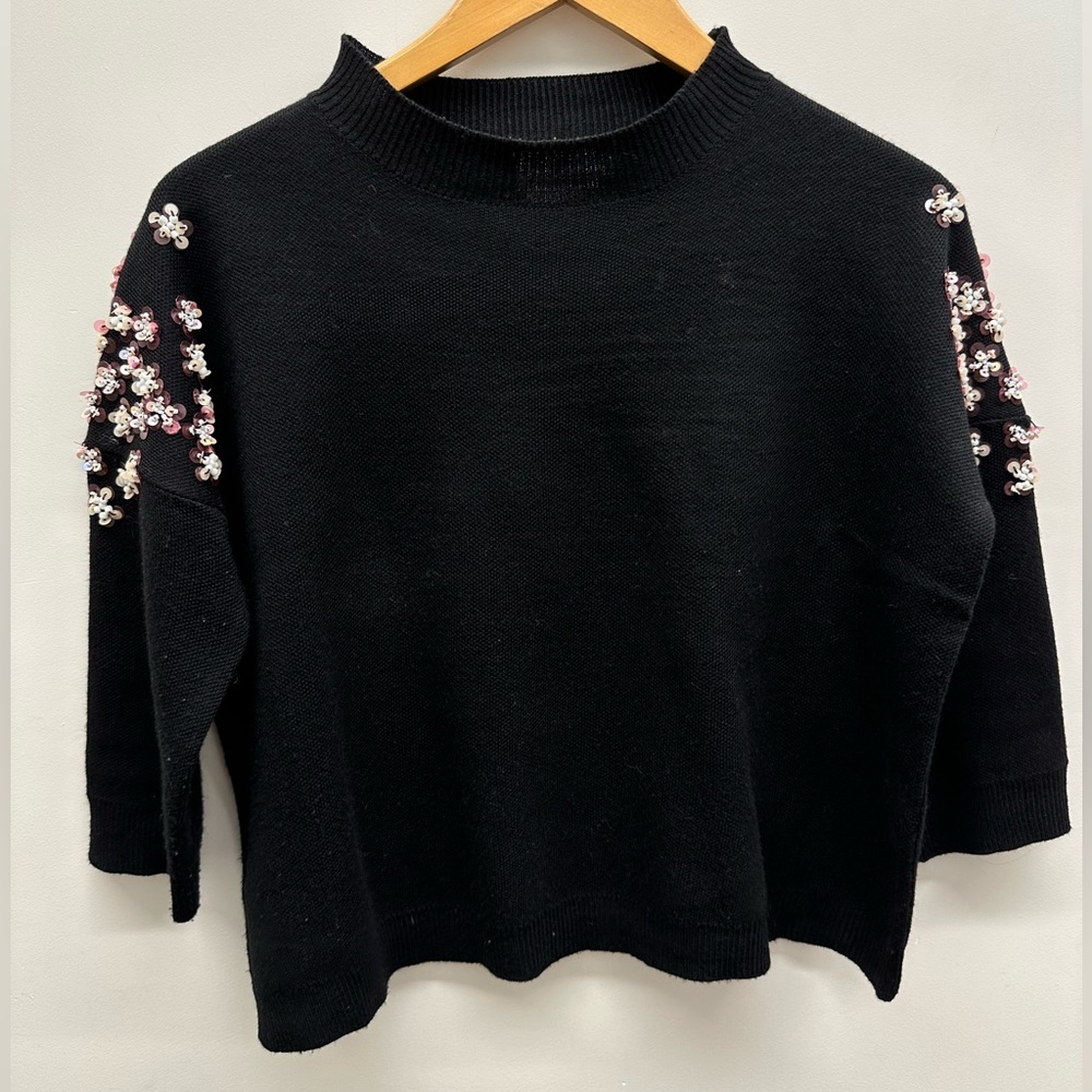 Lili Sidonio X Holly Bracken black sequined sweater.